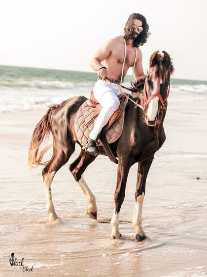 An extensive editorial series of a male model with a horse on the beach. I used a mix of color and black and white, along with varied poses, to create a powerful narrative of untamed strength and freedom.