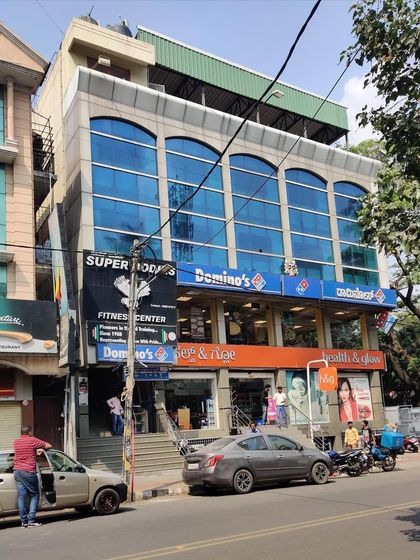 Another view of the building before our intervention, showcasing the plain and generic commercial architecture that we aimed to reinvent.