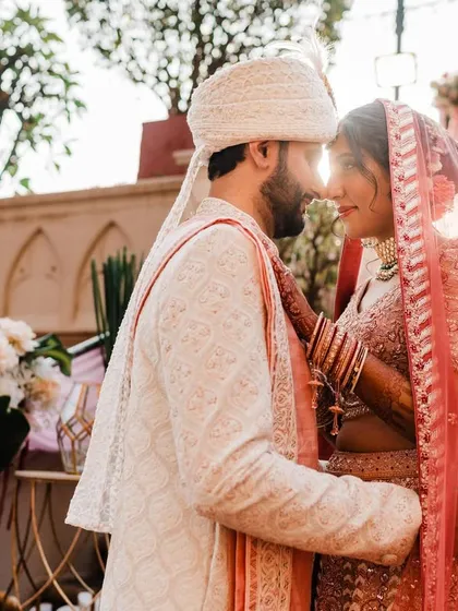 Bathed in the golden light of the sun, this is a moment of pure connection. I look for those quiet pauses between the big events to capture the love that shines brightest when it's just the two of you.