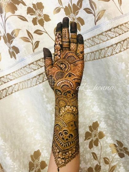 A full-arm design that is perfect for a bridesmaid or close relative.