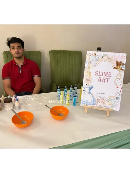 A slime art station is a fun, hands-on activity that I can arrange to keep older kids engaged during the party.