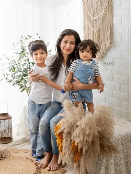 A beautiful portrait of a mother with her two boys. The love and connection between them is so clear in this sweet and candid shot.