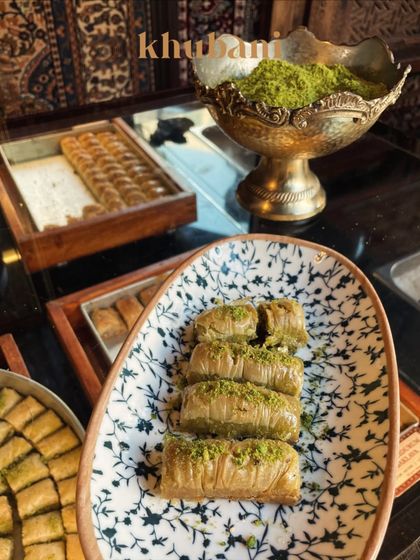 A dessert that tells a story. Our Baklava, inspired by recipes from royal Ottoman courts, is made of delicate filo sheets and roasted pistachios.