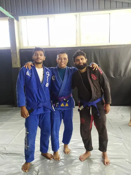 Group photos with my head coach and training partners after the grading ceremony. I'm grateful for everyone who has helped me along the way.