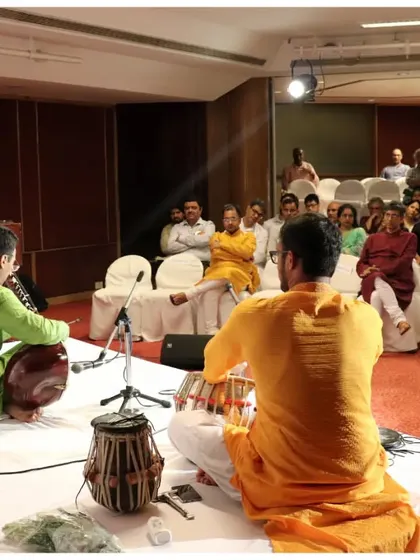 A view from behind the stage, showing the audience engrossed in the performance. I strive to create an immersive experience for every listener.