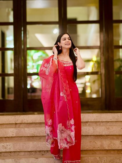 A happy and expressive pose, showing the fun side of dressing up in ethnic wear.