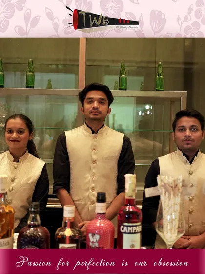 A trio from our bartending team, showcasing the professional and coordinated look we bring to every event.
