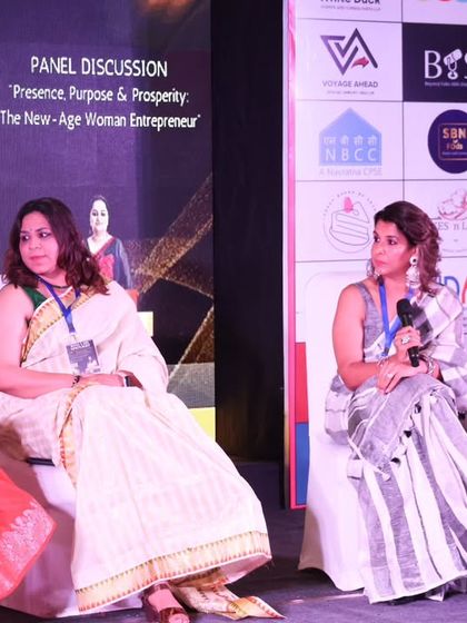 Listening to a question from the host during the panel discussion. Addressing real-world concerns, such as how to pursue entrepreneurship amidst domestic challenges, is a core part of my advocacy.