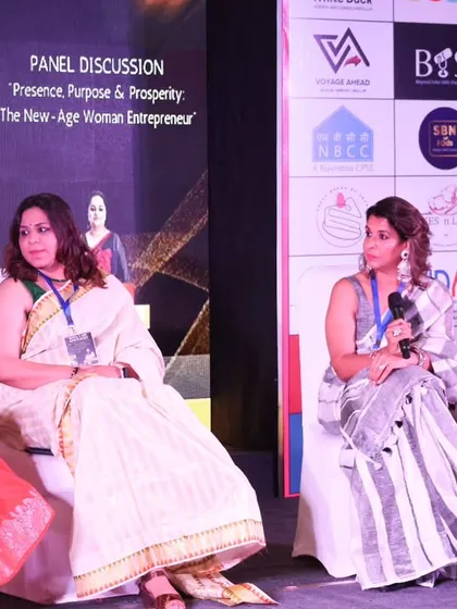 Listening to a question from the host during the panel discussion. Addressing real-world concerns, such as how to pursue entrepreneurship amidst domestic challenges, is a core part of my advocacy.