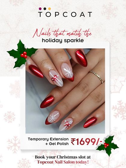 Matching your nails to the holiday sparkle. This Christmas design features metallic red polish and accent nails with hand-painted gift bows and snowflakes on temporary extensions.