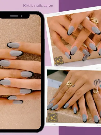 This is a chic and modern take on the French manicure. I used a soft grey gel polish as the base on these almond-shaped extensions and created a crisp, black-tipped design for a sophisticated and edgy look.
