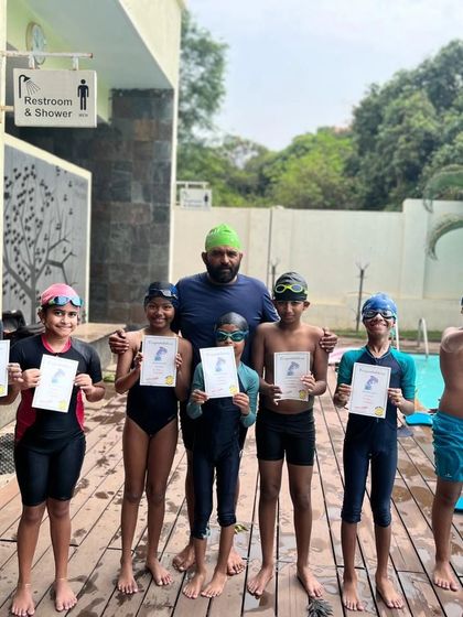 Nisha Millet Swimming Academy - Swimming Lessons Our Program: From Tadpole to Marlin photo 11