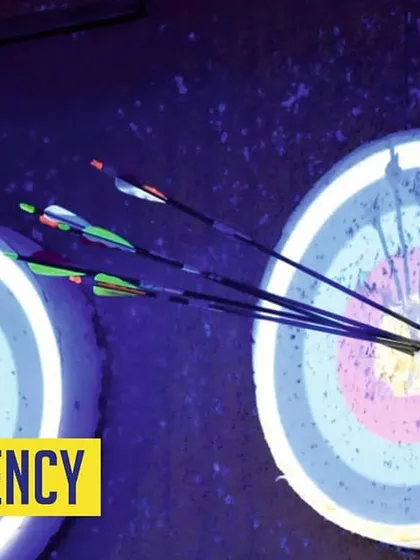 Consistency is key to mastering archery. This close up shows a tight grouping of arrows on the target, a result of focus and practice at our range.