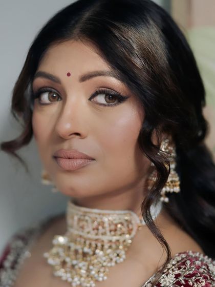A final, stunning close-up of Kavi. Her makeup is a perfect balance of classic techniques and modern sensibilities.