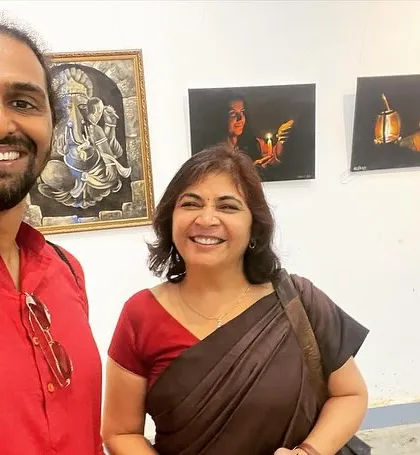 With a delegate from the conference who appreciated the art.