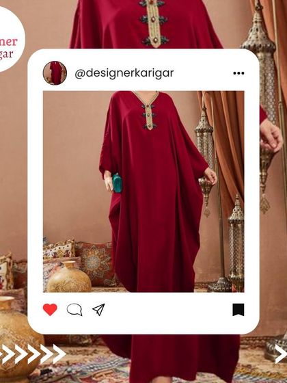A beautiful deep red kaftan with a detailed neckline. This is a perfect example of a simple yet elegant modern kaftan design.