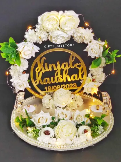 Another angle of the elegant white floral ring platter, showcasing the custom acrylic nameplate.