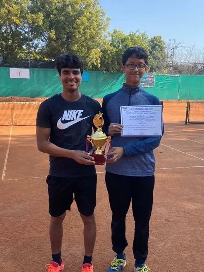 Riddhiman Ojha celebrates winning the CS7 Under-16 Singles title. My coaching focuses on developing the skills needed to succeed in competitive AITA tournaments.