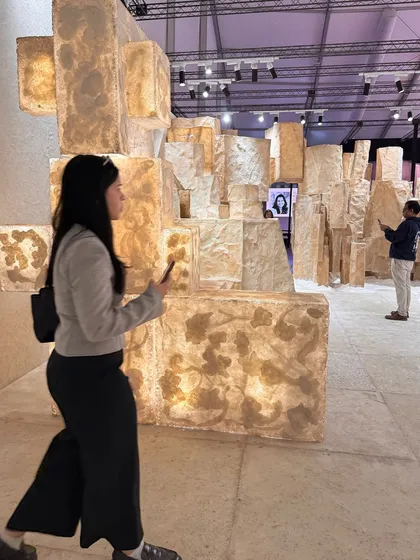 Visitors exploring the 'Salt' installation, a landscape of crystalline forms. We rediscovered this common mineral as a biomaterial of the future, creating an awe-inspiring environment from its simple, natural beauty.