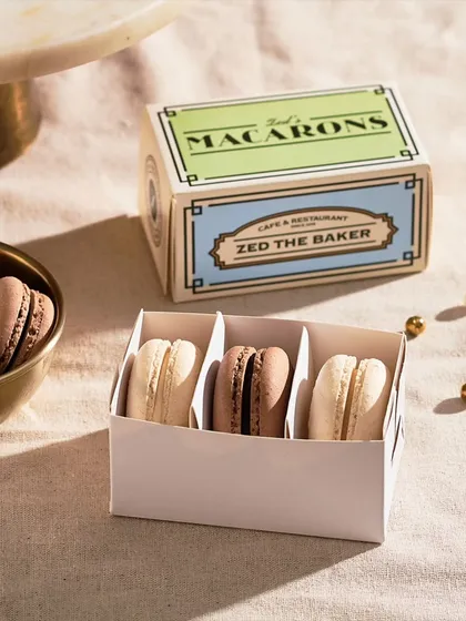 Gifting should be as beautiful as the gift itself. My macarons, with their crisp shells and chewy centers, are presented in this elegant, French-inspired box, making them the perfect present for someone special.