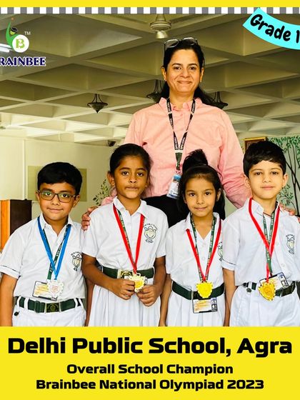 Students of Grade 1E from DPS Agra, the 2023 Overall School Champion, with their medals.