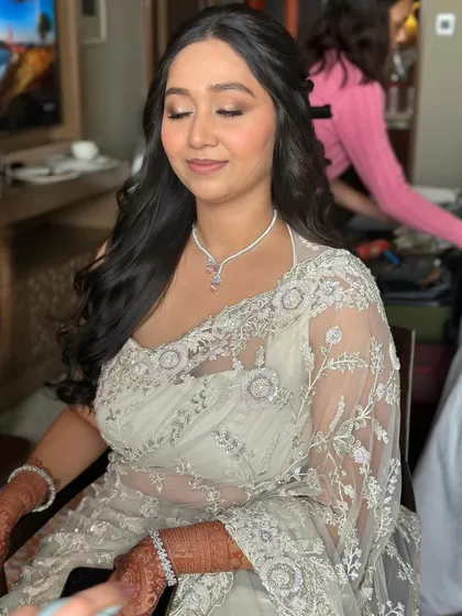 Sache rokafied in our glam. For her Roka ceremony, we went with a soft, ethereal look with glowing skin and gentle waves in her hair.