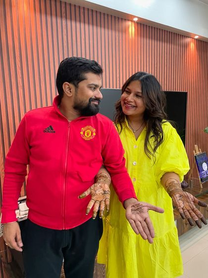 Another candid shot with a lovely couple. Creating mehendi is more than a service, it's about building relationships and being part of their joy.