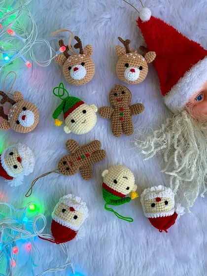 These mini Christmas ornaments are perfect for decorating your tree. The set includes tiny versions of Santa, reindeer, elves, and gingerbread men, all handmade with love.