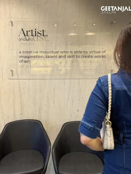 At Geetanjali, we believe every stylist is an artist. This wall art at our Sultanpur salon reflects our core philosophy of creating works of art with every client.