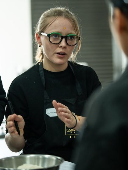 An interactive moment as a student from Italy discusses techniques with one of our instructors.