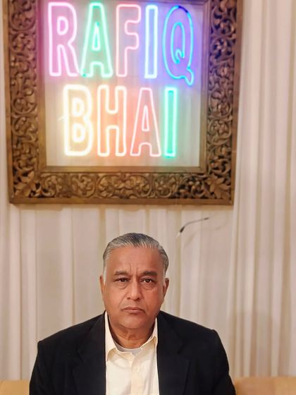 A photo of me, Rafiq Bhai. I stand behind the quality and taste of every dish we serve, carrying on my family's legacy since 2001.