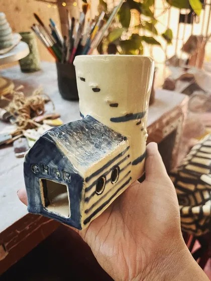 This student took to pottery like a fish to water. In her advanced course, she created this massive, beautiful planter, a real achievement that shows her dedication and skill. I am so proud of her.