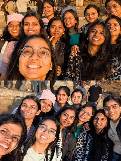 All smiles at the summit. A happy group of women captures their Nandi Hills trekking memory with a series of fun selfies.