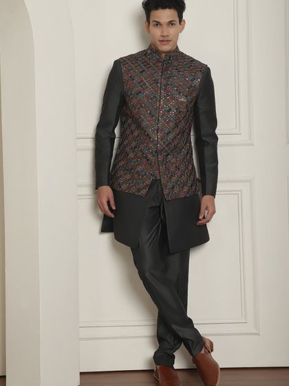 A full view of the charcoal kurta-bundi set. It's an effortless yet high-on-style look that is both comfortable and glamorous.