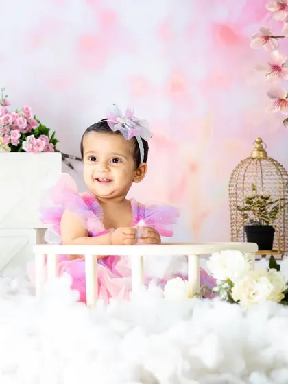 Every little girl deserves a fairy tale moment. In my studio, we can create dreamy worlds with clouds of cotton, cherry blossoms, and a touch of sparkle for a truly magical toddler photoshoot.