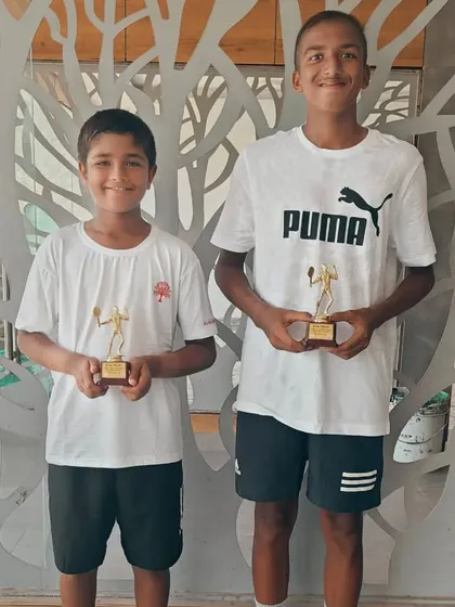 Aarav Chhallani with his partner after their U-16 All India Championship Series Doubles Runners-up finish in Kalina.