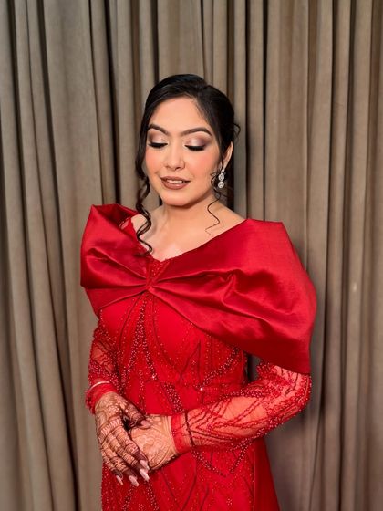 Another shot of Jasleen's cocktail look. The soft, blended makeup ensures she looks glamorous and sophisticated from every angle.