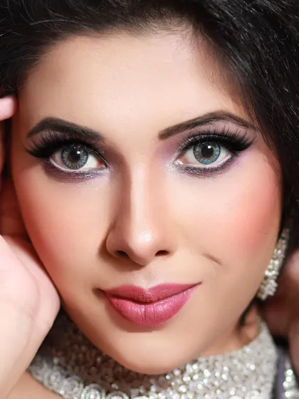 A striking beauty shot with dramatic eye makeup and a diamond choker. This highlights my suitability for jewelry and high-glamour cosmetic brand collaborations.