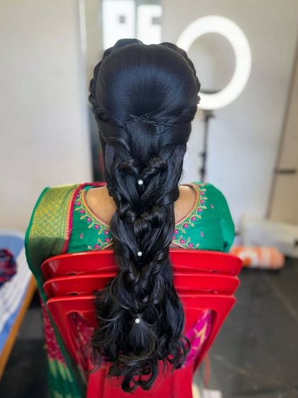 Laxmi Ramkrishna - Special Occasion Hairstyling Creative Braids & Ponytails photo 17