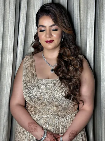 Seret's reception glam. The bold red lip is a classic choice that always makes a statement.