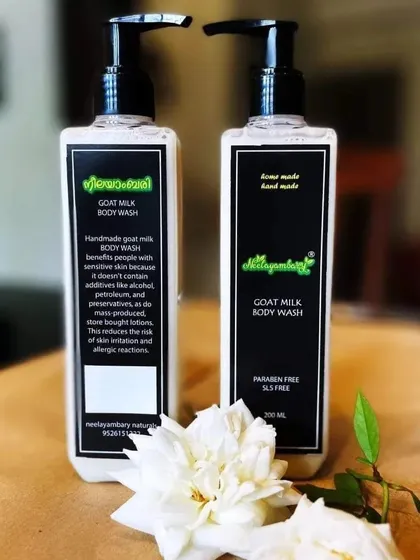 Two bottles of our Goat Milk Body Wash, ready to be shipped. The creamy white liquid is rich with goat's milk and has the beautiful scent of rose essential oil.