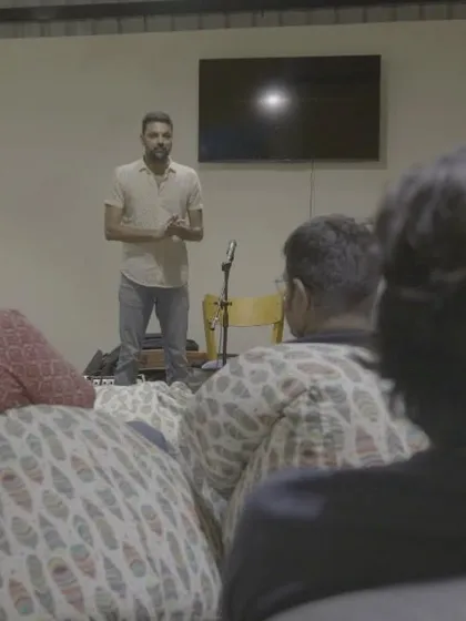 A candid shot of me explaining a trick to the audience. It's important to me that everyone feels involved in the show.