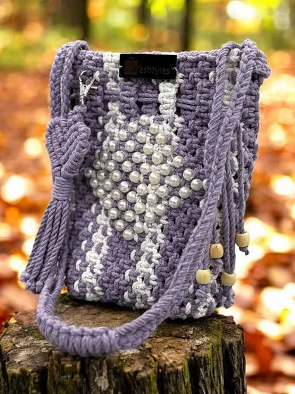 Perfect for weddings and special occasions! This purple and white macrame bag with delicate pearl work shows how I can add an elegant touch to your festive outfits.