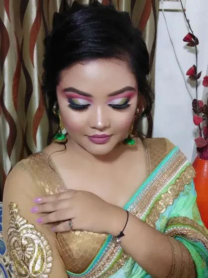 A close-up of the multi-colored eye makeup, showing the beautiful blending of different shades.