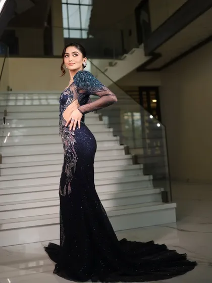 For the modern bride, this cocktail look is all about glamour. I styled this stunning, deep blue sequined gown with a soft glam makeup look and a chic updo, creating a statement for any evening event.