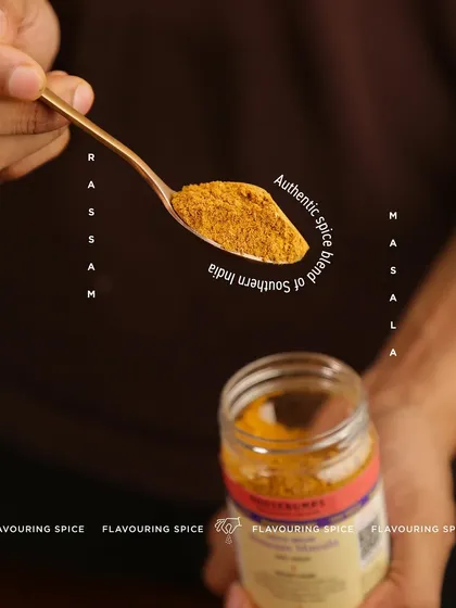 This is my authentic Rasam Masala, a spice blend that captures the soul of Southern India. The fine powder on the spoon is ready to transform your cooking with its bold and aromatic character.