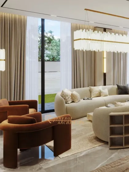 This angle shows the flow between the seating areas, with plush, curved sofas that encourage conversation and interaction, all unified by a neutral color palette.