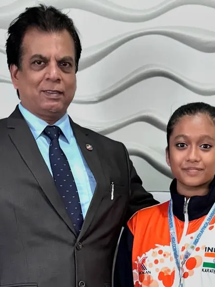 With a young Kata medalist at the Commonwealth Championship. Nurturing talent from a young age is a key focus for KIO.