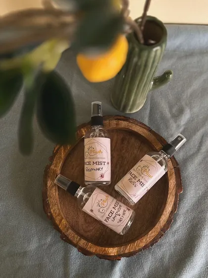 My three face mists displayed in a rustic wooden bowl. They are a beautiful and functional addition to any skincare shelf.