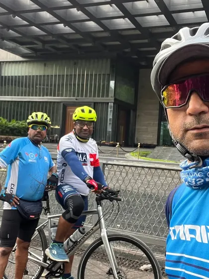A selfie of three cyclists during a break. We are always ready for a photo.